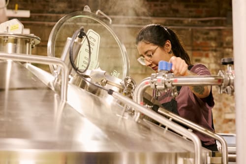 A female brew master at a craft brewery in St. Catharines.